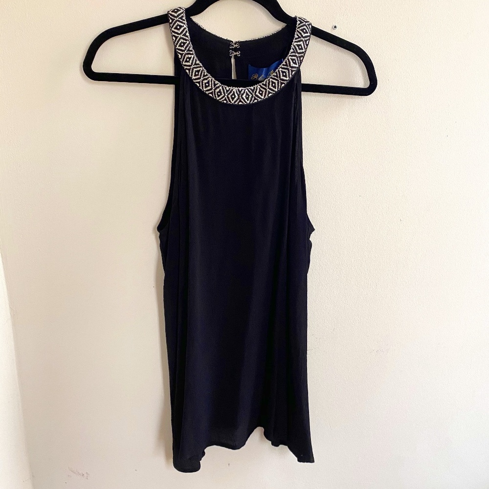 Black high-collar sleeveless blouse